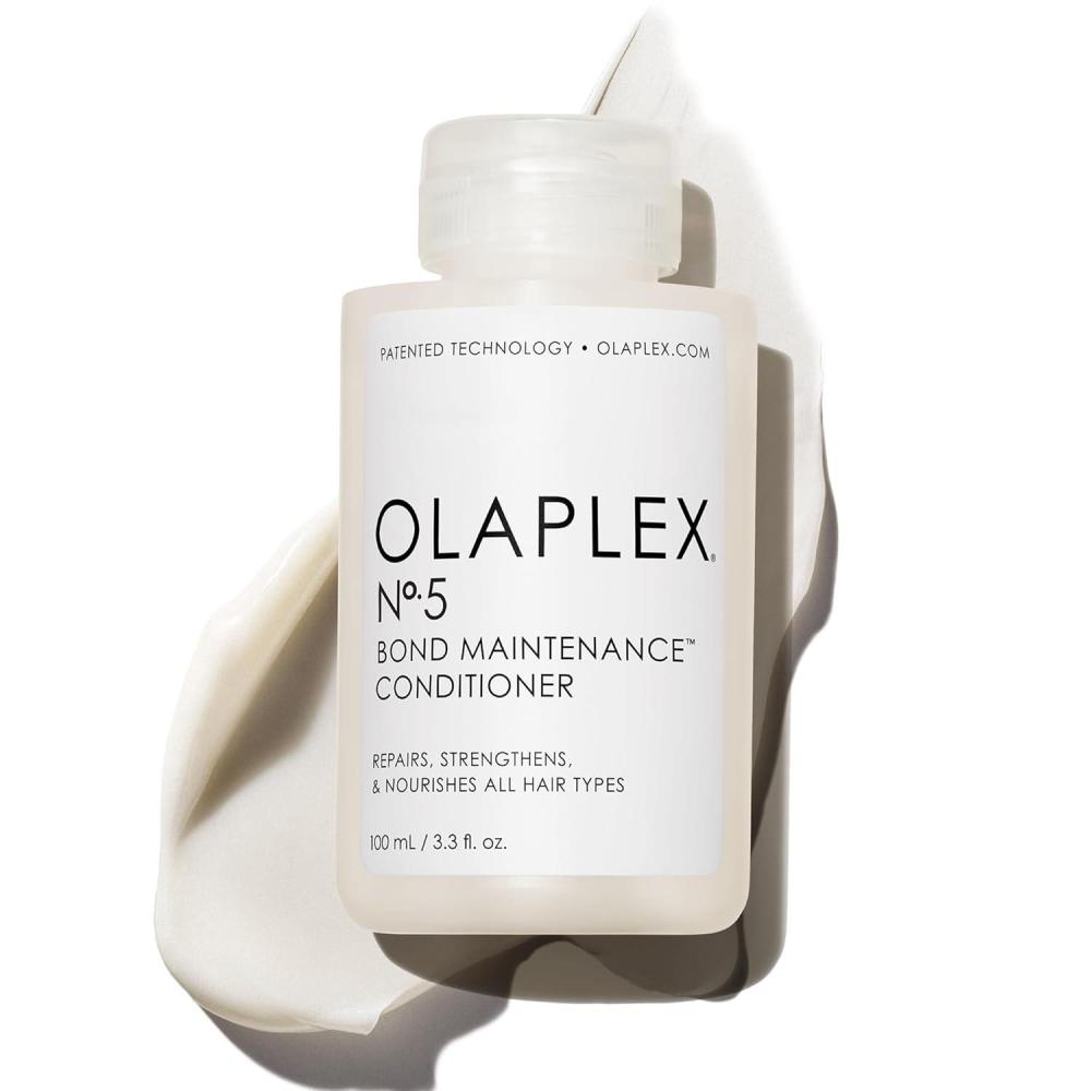 imageOlaplex No 5 Bond Maintenance Conditioner Repairs Strengthens amp Nourishes All Hair Types Leaving Hair Feeling Soft amp Adds Shine33 Fl Oz Pack of 1